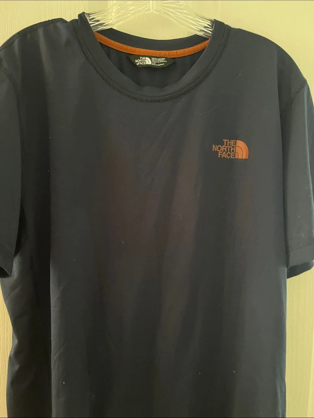 The North Face Men’s Short Sleeve Tee in Navy with Orange Logo